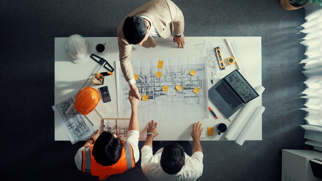 installer, architects and project managers working together on a project